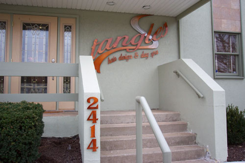 Tangles Hair Design and Day Spa Signage at entrance